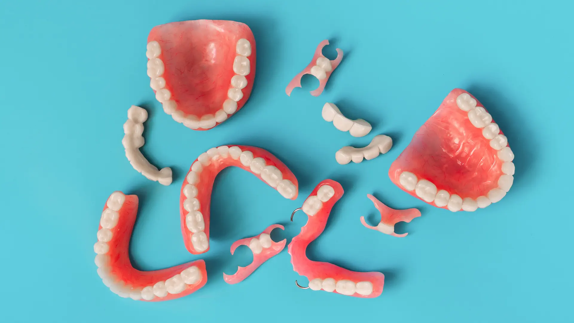 Several repaired dentures displayed after professional repair service.